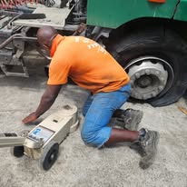 Tyre service being carried out roadside